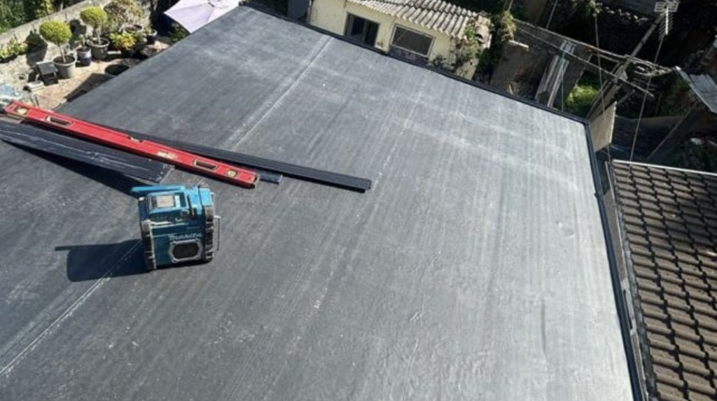 flat rubber roof being installed in hereford by ajc roofing